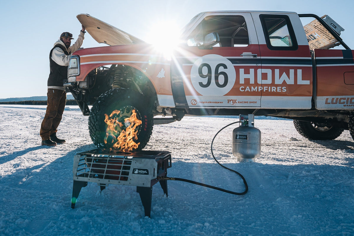 HOWL propane campfire and propane tank in the snow
